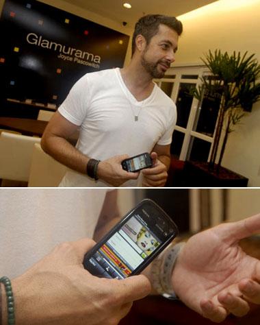 Fernando Torquato com seu Nokia 5800 Comes With Music: sempre alerta